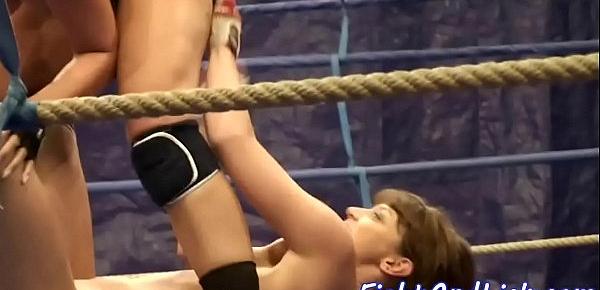  Lesbian babes wrestle in a boxing ring